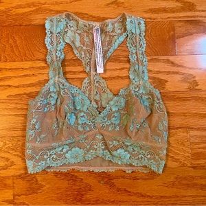 Free people size XS  beautiful lace T back turquoise and beige bralette.